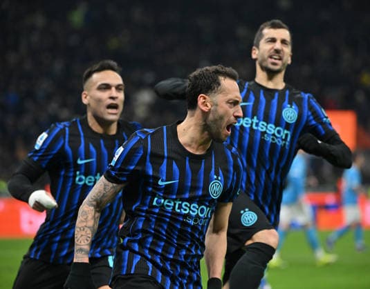 (260112) -- MILAN, Jan. 12, 2026 -- Inter Milan s Hakan Calhanoglu (C) celebrates his goal during a Serie A football match between Inter Milan and Napoli in Milan, Italy, Jan. 11, 2026. (Photo by Xinhua) (SP)ITALY-MILAN-FOOTBALL-SERIE A-INTER MILAN VS NAPOLI AlbertoxLingria 