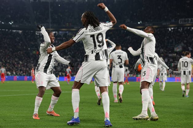 Turin, Italy, 12th January 2026. Jonathan David of Juventus celebrates with team mates Khephren Thuram and Pierre Kalulu after scoring to give the hosts a 2-0 lead during the Juventus vs US Cremonese Serie A match at Allianz Stadium, Turin. Picture credit should read: Jonathan Moscrop Sportimage EDITORIAL USE ONLY. No use with unauthorised audio, video, data, fixture lists, club league logos or live services. Online in-match use limited to 120 images, no video emulation. No use in betting, games or single club league player publications. SPI_009_JM_JUVE_CREMONESE_ SPI-4412-0009