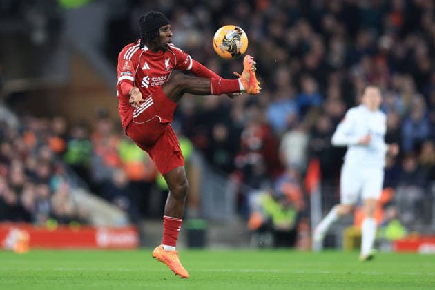 Liverpool, England, 12th January 2026. Jeremie Frimpong of Liverpool controls the ball during the Liverpool vs Barnsley FA Cup match at Anfield, Liverpool. Picture credit should read: Jessica Hornby Sportimage EDITORIAL USE ONLY. No use with unauthorised audio, video, data, fixture lists, club league logos or live services. Online in-match use limited to 120 images, no video emulation. No use in betting, games or single club league player publications. SPI_060_JH_Liverpool_Barnsley SPI-4444-0060