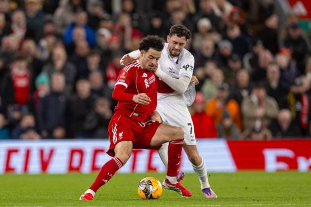Football - FA Cup - 3rd Round - Liverpool FC v Barnsley FC LIVERPOOL, ENGLAND - Monday, January 12, 2026: Liverpool s (L-R) Curtis Jones is challenged by Barnsley s Corey O Keeffe during the FA Cup 3rd Round match between Liverpool FC and Barnsley FC at Anfield. (Photo by David Rawcliffe Propaganda) LIVERPOOL Anfield MERSEYSIDE ENGLAND  Copyright: xPropagandaxPhotoxAgencyx P2026-01-12-Liverpool_Barnsley-62