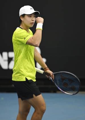 (260113) -- MELBOURNE, Jan. 13, 2026 -- Bai Zhuoxuan of China celebrates during the women s singles qualifying 1st round match against Alina Korneeva of Russia at Australian Open tennis tournament in Melbourne, Australia, Jan. 13, 2026. (Photo by Xinhua) (SP)AUSTRALIA-MELBOURNE-TENNIS-AUSTRALIAN OPEN-WOMEN S SINGLES-QUALIFYING WangxShen 