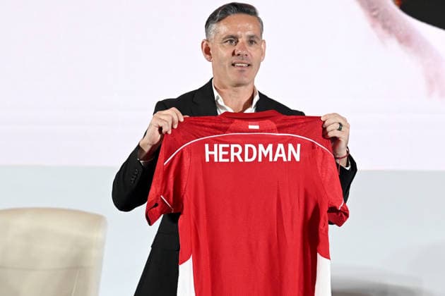 (260113) -- JAKARTA, Jan. 13, 2026 -- John Herdman holds the Indonesian jersey after press conference, PK, Pressekonferenz in Jakarta, Indonesia, Jan. 13, 2025. The Indonesian Football Association (PSSI) officially announced and introduced John Herdman, the British coach as the new head coach of the Indonesian national football team to the public through a press conference. ) (SP)INDONESIA-JAKARTA-FOOTBALL-INDONESIAN national team, Nationalteam NEW COACH-PRESS CONFERENCE AgungxKuncahyaxB. 