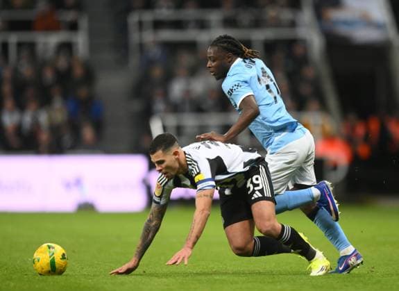 Jeremy Doku of Manchester City fouls Bruno Guimaraes of Newcastle United Newcastle United v Manchester City, EFL Carabao Cup, Semi Final, First Leg, Football, St James Park, Newcastle, UK - 13 Jan 2026Newcastle St James Park United Kingdom EDITORIAL USE ONLY No use with unauthorised audio, video, data, fixture lists, club league logos or live services. Online in-match use limited to 120 images, no video emulation. No use in betting, games or single club league player publications. Copyright: xRichardxLee Shutterstockx 16302979ax