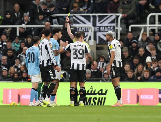Newcastle Upon Tyne, England, 13th January 2026. Joelinton (R) of Newcastle United and Nico O™Reilly (C) of Manchester City yellow cards during the Newcastle United vs Manchester City Carabao Cup match at St. James Park, Newcastle Upon Tyne. Picture credit should read: Nigel Roddis Sportimage EDITORIAL USE ONLY. No use with unauthorised audio, video, data, fixture lists, club league logos or live services. Online in-match use limited to 120 images, no video emulation. No use in betting, games or single club league player publications. SPI_024_NR_NEWC_MANC SPI-4449-0025