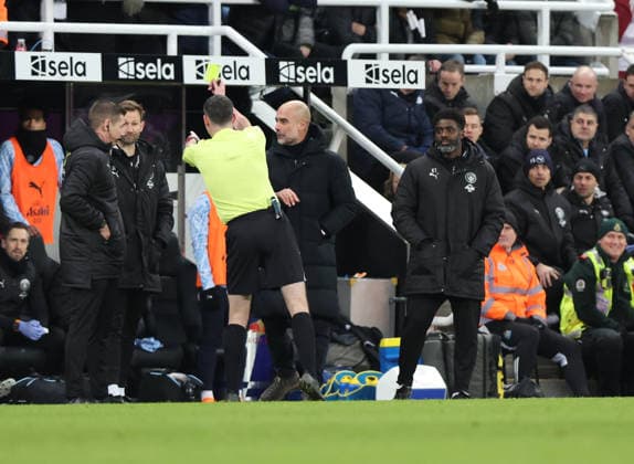 Newcastle Upon Tyne, England, 13th January 2026. Yellow card for a coach of Manchester City during the Newcastle United vs Manchester City Carabao Cup match at St. James Park, Newcastle Upon Tyne. Picture credit should read: Nigel Roddis Sportimage EDITORIAL USE ONLY. No use with unauthorised audio, video, data, fixture lists, club league logos or live services. Online in-match use limited to 120 images, no video emulation. No use in betting, games or single club league player publications. SPI_034_NR_NEWC_MANC SPI-4449-0034