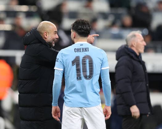 Newcastle Upon Tyne, England, 13th January 2026. Pep Guardiola manager of Manchester City reacts with Rayan Cherki after the Newcastle United vs Manchester City Carabao Cup match at St. James Park, Newcastle Upon Tyne. Picture credit should read: Nigel Roddis Sportimage EDITORIAL USE ONLY. No use with unauthorised audio, video, data, fixture lists, club league logos or live services. Online in-match use limited to 120 images, no video emulation. No use in betting, games or single club league player publications. SPI_038_NR_NEWC_MANC SPI-4449-0040