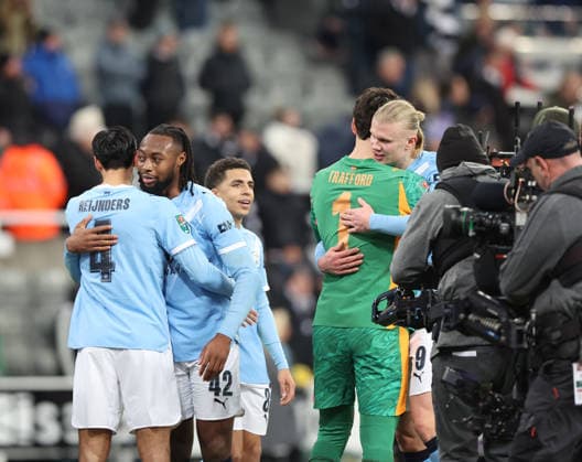 Newcastle Upon Tyne, England, 13th January 2026. Players of Manchester City react after the Newcastle United vs Manchester City Carabao Cup match at St. James Park, Newcastle Upon Tyne. Picture credit should read: Nigel Roddis Sportimage EDITORIAL USE ONLY. No use with unauthorised audio, video, data, fixture lists, club league logos or live services. Online in-match use limited to 120 images, no video emulation. No use in betting, games or single club league player publications. SPI_042_NR_NEWC_MANC SPI-4449-0044