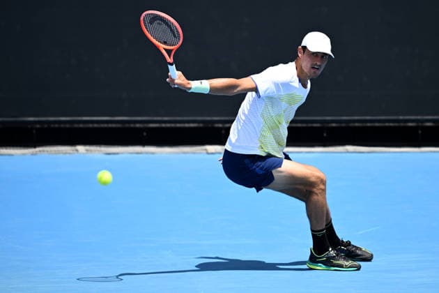 TENNIS AUSTRALIAN OPEN QUALIFYING, Bernard Tomic of Australia in action against Arthur Fery of Great Britain during a qualifying session ahead of the Australian Open tennis tournament at Melbourne Park in Melbourne, Wednesday, January 14, 2026. ( NO ARCHIVING, EDITORIAL USE ONLY MELBOURNE VICTORIA AUSTRALIA  Copyright: xJOELxCARRETTx 20260114170985077696