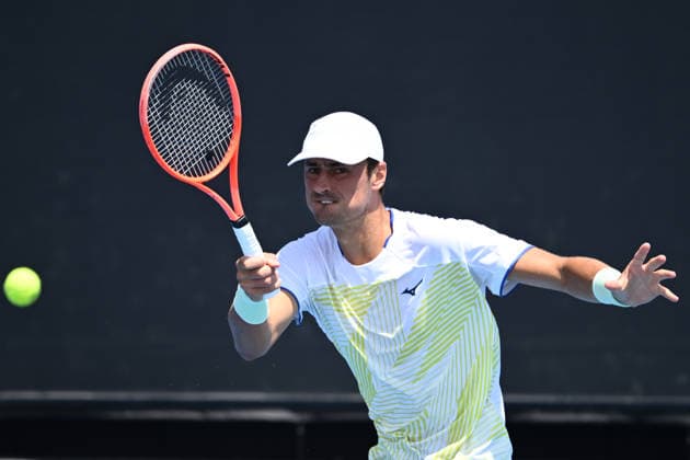 TENNIS AUSTRALIAN OPEN QUALIFYING, Bernard Tomic of Australia in action against Arthur Fery of Great Britain during a qualifying session ahead of the Australian Open tennis tournament at Melbourne Park in Melbourne, Wednesday, January 14, 2026. ( NO ARCHIVING, EDITORIAL USE ONLY MELBOURNE VICTORIA AUSTRALIA  Copyright: xJOELxCARRETTx 20260114196462522113