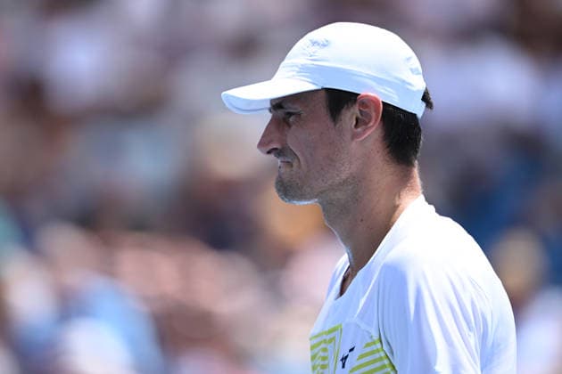 TENNIS AUSTRALIAN OPEN QUALIFYING, Bernard Tomic of Australia in action against Arthur Fery of Great Britain during a qualifying session ahead of the Australian Open tennis tournament at Melbourne Park in Melbourne, Wednesday, January 14, 2026. ( NO ARCHIVING, EDITORIAL USE ONLY MELBOURNE VICTORIA AUSTRALIA  Copyright: xJOELxCARRETTx 20260114157297347930