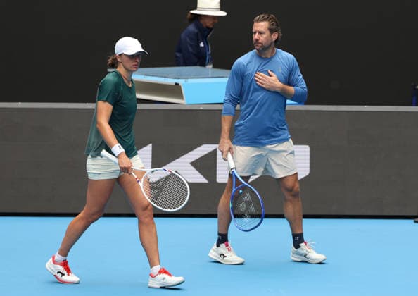 January 14, 2026, Melbourne, Victoria, Australia: IGA SWIATEK of Poland and coach WIM FISSETTE of Belgium during practise session before Australian Open, Melbourne, Australia. Melbourne Australia - ZUMAc278 20260114_zsp_c278_031 Copyright: xMarcinxCholewinskix