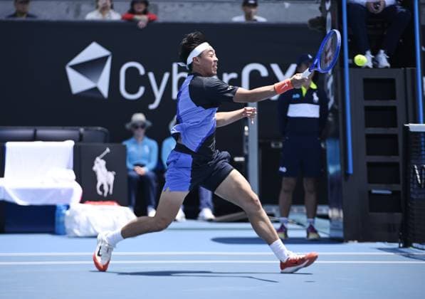 (260114) -- MELBOURNE, Jan. 14, 2026 -- Coleman Wong of China s Hong Kong hits a return during the men s singles qualifying 2nd round match against Pablo Llamas Ruiz of Spain at Australian Open tennis tournament in Melbourne, Australia, Jan. 14, 2026. (Photo by Xinhua) (SP)AUSTRALIA-MELBOURNE-TENNIS-AUSTRALIAN OPEN-MEN S SINGLES-QUALIFYING WangxShen 