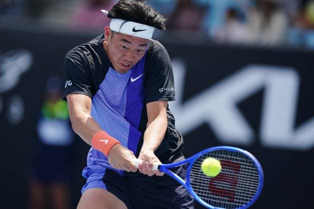 (260114) -- MELBOURNE, Jan. 14, 2026 -- Coleman Wong of China s Hong Kong hits a return during the men s singles qualifying 2nd round match against Pablo Llamas Ruiz of Spain at Australian Open tennis tournament in Melbourne, Australia, Jan. 14, 2026. (Photo by Xinhua) (SP)AUSTRALIA-MELBOURNE-TENNIS-AUSTRALIAN OPEN-MEN S SINGLES-QUALIFYING WangxShen 