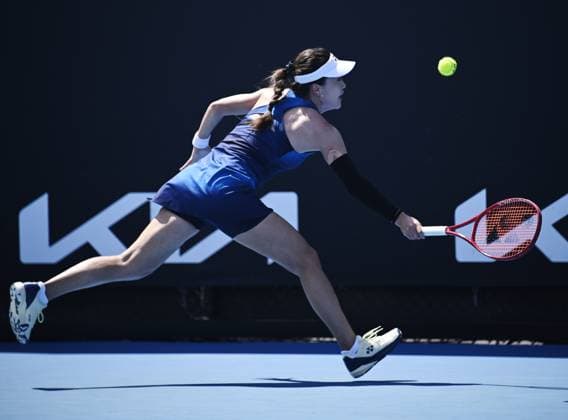 (260114) -- MELBOURNE, Jan. 14, 2026 -- Zhu Lin of China hits a return during the women s singles qualifying 2nd round match against Victoria Jimenez Kasintseva of Andorra at Australian Open tennis tournament in Melbourne, Australia, Jan. 14, 2026. (Photo by Xinhua) (SP)AUSTRALIA-MELBOURNE-TENNIS-AUSTRALIAN OPEN-WOMEN S SINGLES-QUALIFYING WangxShen 