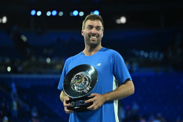 TENNIS AO 1 POINT SLAM, Jordan Smith of New South Wales reacts while holding the trophy after defeating Joanna Garland of Taiwan to win the 1 Point Slam event during the Australian Open Opening Week at Rod Laver Arena in Melbourne, Victoria, Wednesday, January 14, 2026. ( NO ARCHIVING, EDITORIAL USE ONLY Melbourne Victoria Australia  Copyright: xJamesxRossx 20260114144547784754