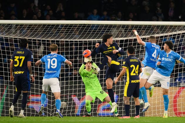 Filippo Rinaldi of Parma Calcio saves on Alessandro Buongiorno of SSC Napoli during the Serie A 2025 2026 football match between SSC Napoli and Parma Calcio 1913 at Diego Armando Maradona stadium in Naples (Italy), January 14, 2026. andreaxstaccioli