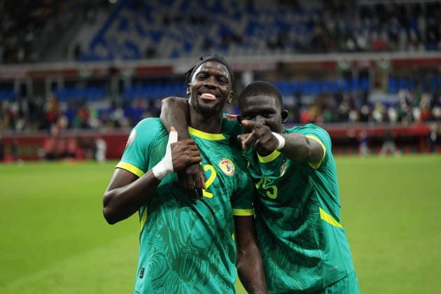Sport Bilder des Tages PAPE NDIAYE and MALICK DIOUF celebrate Senegal qualification for the Final during Africa Cup of Nations Morocco 2025 - SEMI-FINAL. SENEGAL VS EGYÐ T - TANGER STADIUM. 14-01-2026. By IMAGO Didier Lefa Studio TANGER TANGER STADIUM Morocco