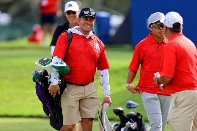 January 14, 2026 - University of Hawaii Rainbow Warrior Football Head Coach Timmy Chang caddies during a Pro-Am prior to the 2026 Sony Open in Hawaii at Waialae Country Club in Honolulu, HI - CSM Honolulu USA - ZUMAc04_ 20260114_zma_c04_126 Copyright: xAndrewxLeex