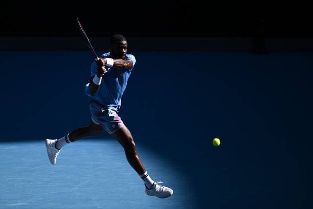 TENNIS AUSTRALIAN OPEN, Frances Tiafoe of the US in action against Novak Djokovic of Serbia during a charity match ahead of the Australian Open tennis tournament at Melbourne Park in Melbourne, Thursday, January 15, 2026. ( NO ARCHIVING, EDITORIAL USE ONLY MELBOURNE VICTORIA AUSTRALIA  Copyright: xJOELxCARRETTx 20260115114496415438