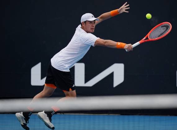 (260115) -- MELBOURNE, Jan. 15, 2026 -- Wu Yibing of China hits a return during the men s singles qualifying final round match against Tristan Boyer of the United States at Australian Open tennis tournament in Melbourne, Australia, Jan. 15, 2026. (Photo by Xinhua) (SP)AUSTRALIA-MELBOURNE-TENNIS-AUSTRALIAN OPEN-MEN S SINGLES-QUALIFYING WangxShen 