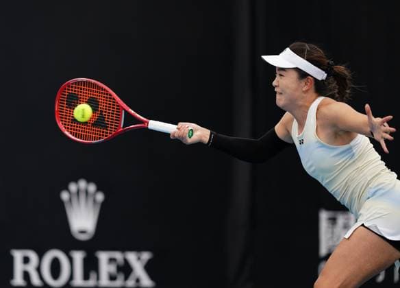 (260115) -- MELBOURNE, Jan. 15, 2026 -- Zhu Lin of China hits a return during the women s singles qualifying final round match against Marina Stakusic of Canada at Australian Open tennis tournament in Melbourne, Australia, Jan. 15, 2026. (Photo by Xinhua) (SP)AUSTRALIA-MELBOURNE-TENNIS-AUSTRALIAN OPEN-WOMEN S SINGLES-QUALIFYING WangxShen 