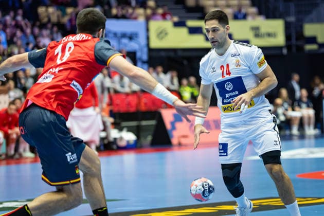 HERNING, DENMARK - JANUARY 15: Imanol Garciandia Alustiza (Spain, 18) against Lazar Kukic (Serbia, 24) during the EHF EURO 2026 match between Germany vs Austria at Jyske Bank Boxen Arena on matchday 1 of the Group Matches Group A on January 15, 2026 in Herning, Denmark. Midtjylland Denmark Copyright: xMarioxM.xKobergx