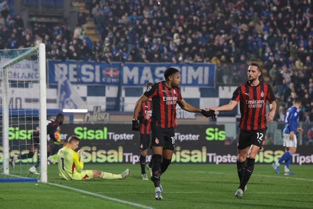 Como, Italy, 15th January 2026. Christopher Nkunku of AC Milan celebrates with team mate Adrien Rabiot after scoring a first half penalty to level things at 1-1 during the Como 1907 vs AC Milan Serie A match at Stadio Giuseppe Sinigaglia, Como. Picture credit should read: Jonathan Moscrop Sportimage EDITORIAL USE ONLY. No use with unauthorised audio, video, data, fixture lists, club league logos or live services. Online in-match use limited to 120 images, no video emulation. No use in betting, games or single club league player publications. SPI_031_JM_COMO_MILAN_ SPI-4414-0031