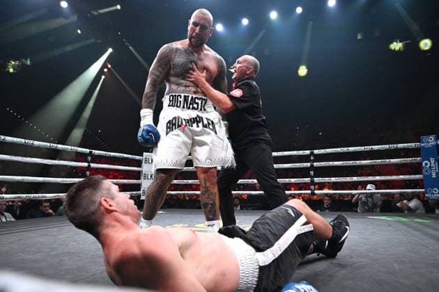 BOXING TSZYU ZERAFA, Nelson Asofa-Solomona is seen being held back by the referee after knocking out Jeremy Latimore during their Heavyweight bout on the undercard of the Nikita Tszyu and Michael Zerafa fight at the Brisbane Entertainment Centre in Brisbane, Friday, January 16, 2026. ( NO ARCHIVING, EDITORIAL USE ONLY BRISBANE QUEENSLAND AUSTRALIA  Copyright: xDARRENxENGLANDx 20260116175078478443