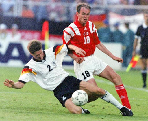 920612 Football, UEFA EURO, EM, Europameisterschaft,Fussball 1992, Group 2, CIS (Russia) - Germany 1-1: Germanys Stefan Reuter (L) against Viktor Onopko of CIS. Photo: BILDBYRAN M027_12 scanx fotboll em em92 em 92 em 1992 em1992 oss cis tyskland m027_12 bbeng dia sovjet russia ryssland CIS v Germany beng football soccer 1992 sverige sweden oberoende staters samvalde commonwealth of independent states euro uefa euro 1992 euro1992 euro92 european championships norrkoping stadium june 12 idrottsparken *** 920612 Football, Uefa EURO 1992, Group 2, CIS Russia Germany 1 1 Germanys Stefan Reuter L against Viktor Onopko of CIS Photo BILDBYRAN M027 12 scanx fotboll em em92 em 92 em 1992 em1992 oss cis tyskland m027 12 bbeng dia sovjet russia ryssland CIS v Germany beng football soccer 1992 sverige sweden oberoende staters samvalde commonwealth of independent states euro uefa euro 1992 euro1992 euro92 european championships norrkoping stadium june 12 idrottsparken  Copyright: BILDBYRAN BB920612BB037