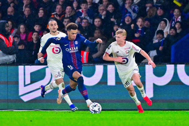 FOOTBALL : PSG vs Lille - Ligue1 - 16 01 2026 Desire Doue ( 14 - PSG ) and Hakon Haraldsson ( 10 - Lille ) during the Ligue 1 match between Paris Saint Germain and Lille OSC at Parc Des Princes on January 16 , 2026 in Paris, France. ( Photo by Federico Pestelini PsnewZ ) - ParisFrance  Copyright: xFedericoxPestelinix