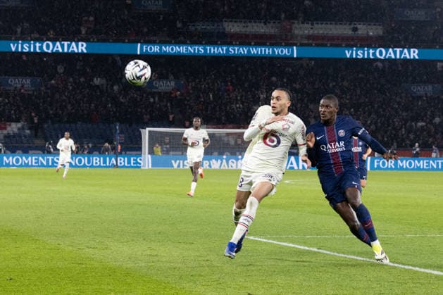 L1 football match PSG v LOSC - Paris LOSC 8 Ethan Mbappe, Paris Saint-Germain s Portuguese defender 25 Nuno Mendes during French L1 football match between Paris Saint-Germain (PSG) and Lille LOSC at the Parc des Princes stadium in Paris on January 16, 2026. Photo by Raphael Lafargue ABACAPRESS.COM Paris France  Copyright: xLafarguexRaphael ABACAx