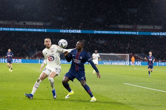L1 football match PSG v LOSC - Paris LOSC 8 Ethan Mbappe, Paris Saint-Germain s Portuguese defender 25 Nuno Mendes during French L1 football match between Paris Saint-Germain (PSG) and Lille LOSC at the Parc des Princes stadium in Paris on January 16, 2026. Photo by Raphael Lafargue ABACAPRESS.COM Paris France  Copyright: xLafarguexRaphael ABACAx