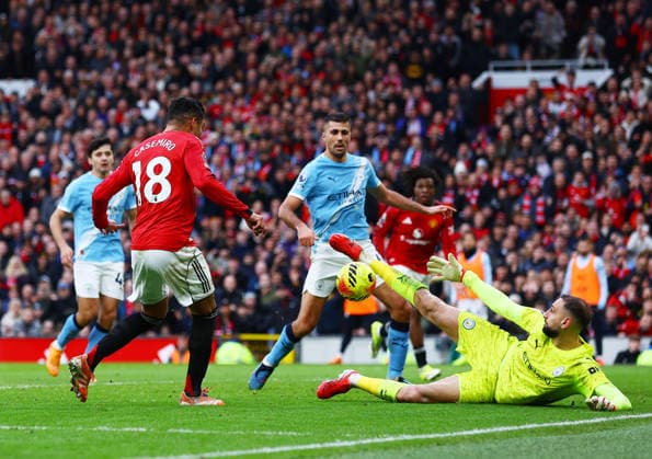 Manchester City goalkeeper Gianluigi Donnarumma makes a save from Casemiro of Manchester United, ManU Manchester United v Manchester City, Premier League, Football, Old Trafford, Manchester, UK - 17 Jan 2026Manchester Old Trafford United Kingdom EDITORIAL USE ONLY No use with unauthorised audio, video, data, fixture lists, club league logos or live services. Online in-match use limited to 120 images, no video emulation. No use in betting, games or single club league player publications.  Copyright: xMattxWest Shutterstockx 16347907ad