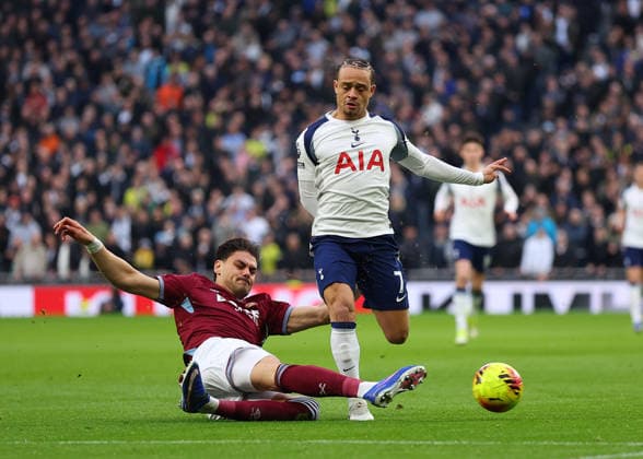 17th January 2026; Tottenham Hotspur Stadium, London, England; Premier League Football, Tottenham Hotspur versus West Ham United; Xavi Simons of Tottenham Hotspur tackled by Konstantinos Mavropanos of West Ham United  JohnxPatrickxFletcher