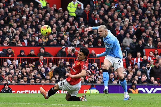 17th January 2026; Old Trafford, Manchester, England; Premier League Football, Manchester United, ManU versus Manchester City; Erling Haaland of Manchester Citysees his shot blocked by Lisandro Martinez of Manchester United  DavidxBlunsden