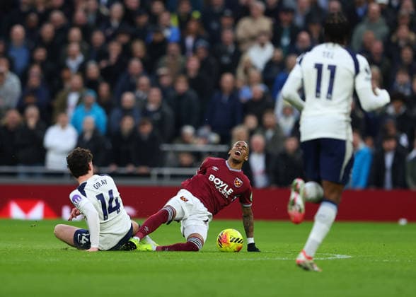 17th January 2026; Tottenham Hotspur Stadium, London, England; Premier League Football, Tottenham Hotspur versus West Ham United; Crysencio Summerville of West Ham United tackled by Archie Gray of Tottenham Hotspur  JohnxPatrickxFletcher