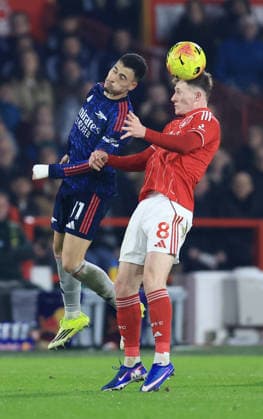 Nottingham, England, 17th January 2026. Gabriel Martinelli of Arsenal pressures Elliot Anderson of Nottingham Forest during the Nottingham Forest vs Arsenal Premier League match at the City Ground, Nottingham. Picture credit should read: Jessica Hornby Sportimage EDITORIAL USE ONLY. No use with unauthorised audio, video, data, fixture lists, club league logos or live services. Online in-match use limited to 120 images, no video emulation. No use in betting, games or single club league player publications. SPI_046_JH_FOREST_ARSENAL SPI-4459-0046