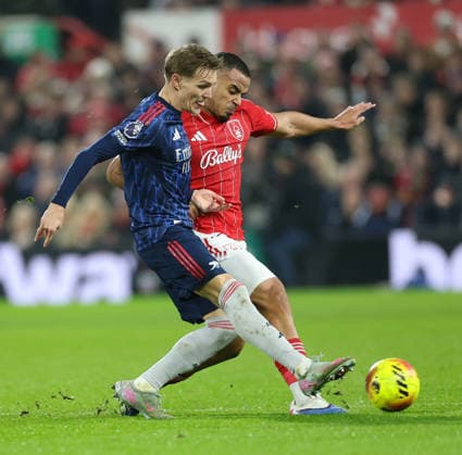 Nottingham Forest v Arsenal Premier League Martin odegaard of Arsenal is closed down Murillo of Nottingham Forest during the Premier League match at the City Ground, Nottingham 17 01 2026 UK Newspapers OUT Copyright: xAndyxSumnerx FIL-22829-0038