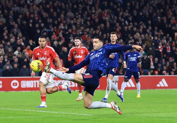 Nottingham, England, 17th January 2026. Mikel Merino of Arsenal shoots wide during the Nottingham Forest vs Arsenal Premier League match at the City Ground, Nottingham. Picture credit should read: Jessica Hornby Sportimage EDITORIAL USE ONLY. No use with unauthorised audio, video, data, fixture lists, club league logos or live services. Online in-match use limited to 120 images, no video emulation. No use in betting, games or single club league player publications. SPI_057_JH_FOREST_ARSENAL SPI-4459-0057
