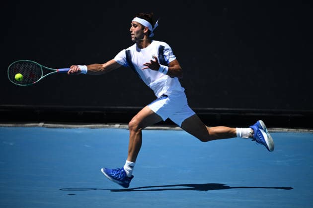 TENNIS AUSTRALIAN OPEN, Tomas Martin Etcheverry of Argentina in action during the Men™s 1st round match against Miomir Kecmanovic of Serbia on day 1 of the 2026 Australian Open tennis tournament at Melbourne Park in Melbourne, Sunday, January 18, 2026. ( NO ARCHIVING MELBOURNE VICTORIA AUSTRALIA  Copyright: xJOELxCARRETTx 20260118186467959249