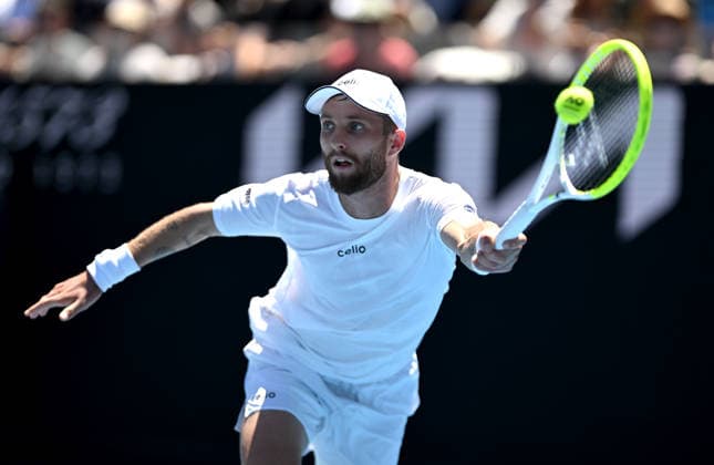 TENNIS AUSTRALIAN OPEN, Corentin Moutet of France in action during the Men™s 1st round match against Tristan Schoolkate of Australia on day 1 of the 2026 Australian Open tennis tournament at Melbourne Park in Melbourne, Wednesday, January 14, 2026. ( NO ARCHIVING MELBOURNE VICTORIA AUSTRALIA  Copyright: xLUKASxCOCHx 20260118154195152994