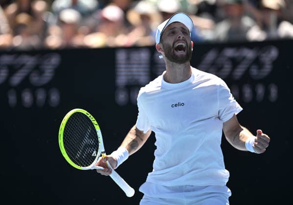TENNIS AUSTRALIAN OPEN, Corentin Moutet of France reacts during the Men™s 1st round match against Tristan Schoolkate of Australia on day 1 of the 2026 Australian Open tennis tournament at Melbourne Park in Melbourne, Wednesday, January 14, 2026. ( NO ARCHIVING MELBOURNE VICTORIA AUSTRALIA  Copyright: xLUKASxCOCHx 20260118117111611776