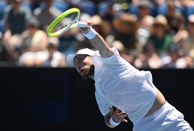 TENNIS AUSTRALIAN OPEN, Corentin Moutet of France returns during the Men™s 1st round match against Tristan Schoolkate of Australia on day 1 of the 2026 Australian Open tennis tournament at Melbourne Park in Melbourne, Wednesday, January 14, 2026. ( NO ARCHIVING MELBOURNE VICTORIA AUSTRALIA  Copyright: xLUKASxCOCHx 20260118163283066489