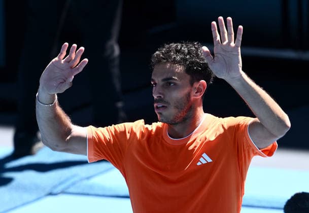 TENNIS AUSTRALIAN OPEN, Francisco Cerundolo of Argentina celebrates after winning the Men™s 1st round match against Zhizhen Zhang of China on day 1 of the 2026 Australian Open tennis tournament at Melbourne Park in Melbourne, Sunday, January 18, 2026. ( NO ARCHIVING MELBOURNE VICTORIA AUSTRALIA  Copyright: xJOELxCARRETTx 20260118141728793129