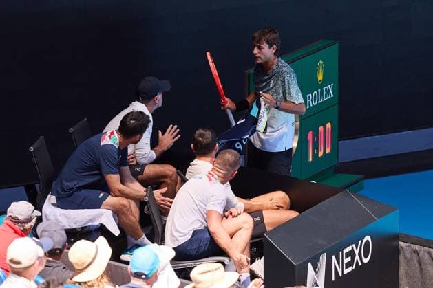 A frustrated Flavio Cobolli of Italy talks to his team during his first round match Australian Open tennis tournament, Day One, Melbourne Park, Australia - 18 Jan 2026Melbourne Melbourne Park Victoria (VIC) Australia  Copyright: xRachelxBach Shutterstockx 16302999u