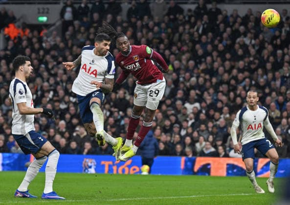 (260118) -- LONDON, Jan. 18, 2026 -- Cristian Romero (2nd L) of Tottenham Hotspur scores during the English Premier League match between Tottenham Hotspur and West Ham United in London, Britain, on Jan. 17, 2026. FOR EDITORIAL USE ONLY. NOT FOR SALE FOR MARKETING OR ADVERTISING CAMPAIGNS. NO USE WITH UNAUTHORIZED AUDIO, VIDEO, DATA, FIXTURE LISTS, CLUB LEAGUE LOGOS OR LIVE SERVICES. ONLINE IN-MATCH USE LIMITED TO 45 IMAGES, NO VIDEO EMULATION. NO USE IN BETTING, GAMES OR SINGLE CLUB LEAGUE PLAYER PUBLICATIONS. (SP)BRITAIN-LONDON-FOOTBALL-PREMIER LEAGUE-TOTTENHAM HOTSPUR VS WEST HAM UNITED LixYing 