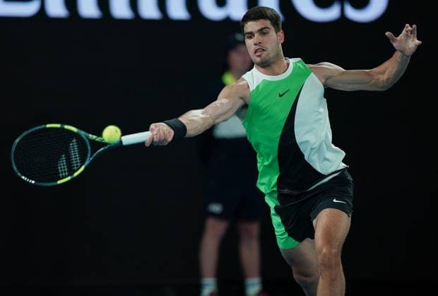 (260118) -- MELBOURNE, Jan. 18, 2026 -- Carlos Alcaraz of Spain hits a return during the men s singles 1st round match between Carlos Alcaraz of Spain and Adam Walton of Australia at the Australian Open tennis tournament in Melbourne, Australia, Jan. 18, 2026. (Photo by Xinhua) (SP)AUSTRALIA-MELBOURNE-TENNIS-AUSTRALIAN OPEN-MEN S SINGLES WangxShen 