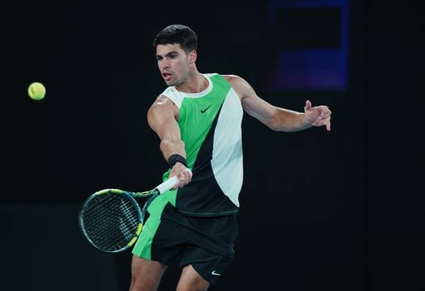 (260118) -- MELBOURNE, Jan. 18, 2026 -- Carlos Alcaraz of Spain hits a return during the men s singles 1st round match between Carlos Alcaraz of Spain and Adam Walton of Australia at the Australian Open tennis tournament in Melbourne, Australia, Jan. 18, 2026. (Photo by Xinhua) (SP)AUSTRALIA-MELBOURNE-TENNIS-AUSTRALIAN OPEN-MEN S SINGLES WangxShen 