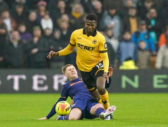 Wolverhampton, England, 18th January 2026. Yerson Mosquera of Wolverhampton Wanderers fouled by Lewis Hall during the Wolverhampton Wanderers vs Newcastle United Premier League match at Molineux, Wolverhampton. Picture credit should read: Andrew Yates Sportimage EDITORIAL USE ONLY. No use with unauthorised audio, video, data, fixture lists, club league logos or live services. Online in-match use limited to 120 images, no video emulation. No use in betting, games or single club league player publications. SPI_044_AY_Wolves_Newcastle SPI-4461-0043