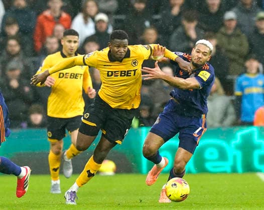 Wolverhampton, England, 18th January 2026. Yerson Mosquera of Wolverhampton Wanderers (l) and Joelinton of Newcastle United (r) during the Wolverhampton Wanderers vs Newcastle United Premier League match at Molineux, Wolverhampton. Picture credit should read: Andrew Yates Sportimage EDITORIAL USE ONLY. No use with unauthorised audio, video, data, fixture lists, club league logos or live services. Online in-match use limited to 120 images, no video emulation. No use in betting, games or single club league player publications. SPI_052_AY_Wolves_Newcastle SPI-4461-0051
